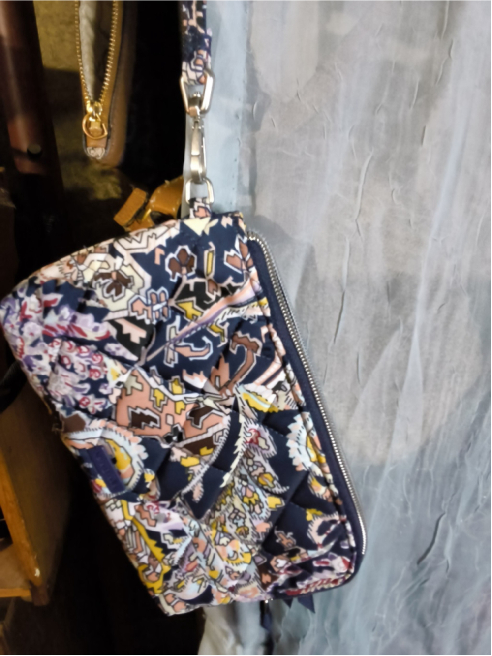 Vera Bradley wristlet and features their Tangier Paisley pattern.